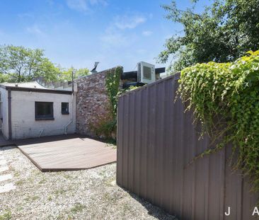 Inner-City Convenience with Outdoor Space - Photo 4