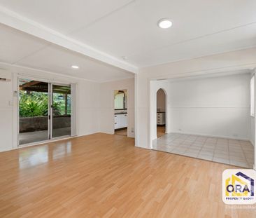 FRESHLY RENOVATED 4 BEDROOM HOME + BONUS STORAGE CONTAINER! - Photo 2
