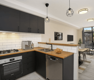 Dual Level Living In Ultra Convenient Location - Photo 3