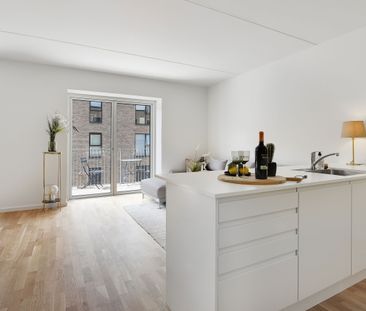 Stilfuld 2-værelses lejlighed med egen terrasse og stor stue - Foto 5