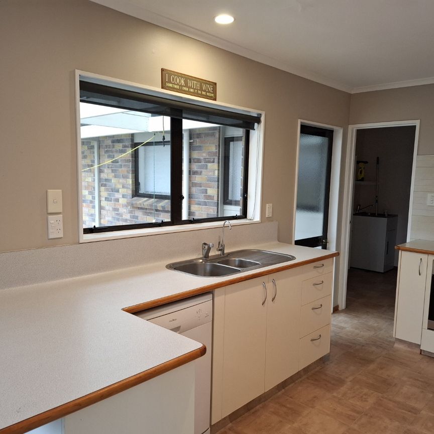 This fantastic family home offers a generous open-plan living on the ground floor, seamlessly flowing out to a rear patio and fully fenced yard—perfect for entertaining or relaxing with family. - Photo 1