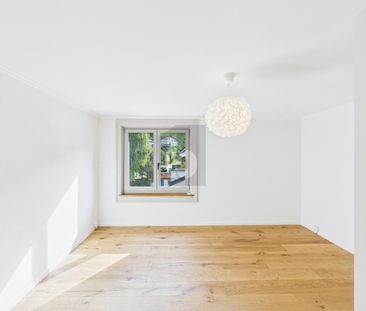 GENEROUS AND NEWLY RENOVATED - Photo 2