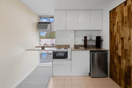 Furnished & Renovated Studio with Parking in Prime Harbourside Location - Photo 2