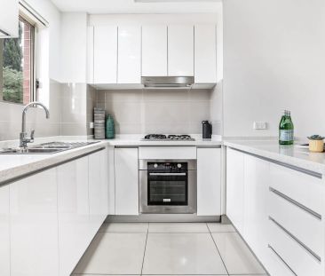 Spacious Tri-Level Townhouse in a Quiet, Convenient Setting - Photo 3