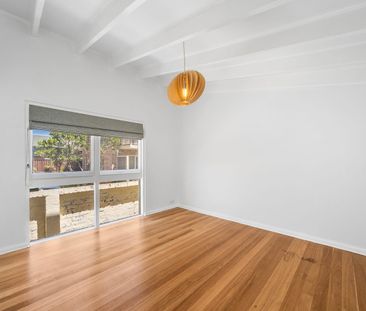 Beautifully Renovated Four-Bedroom Home with Spacious Outdoor Living - Photo 3