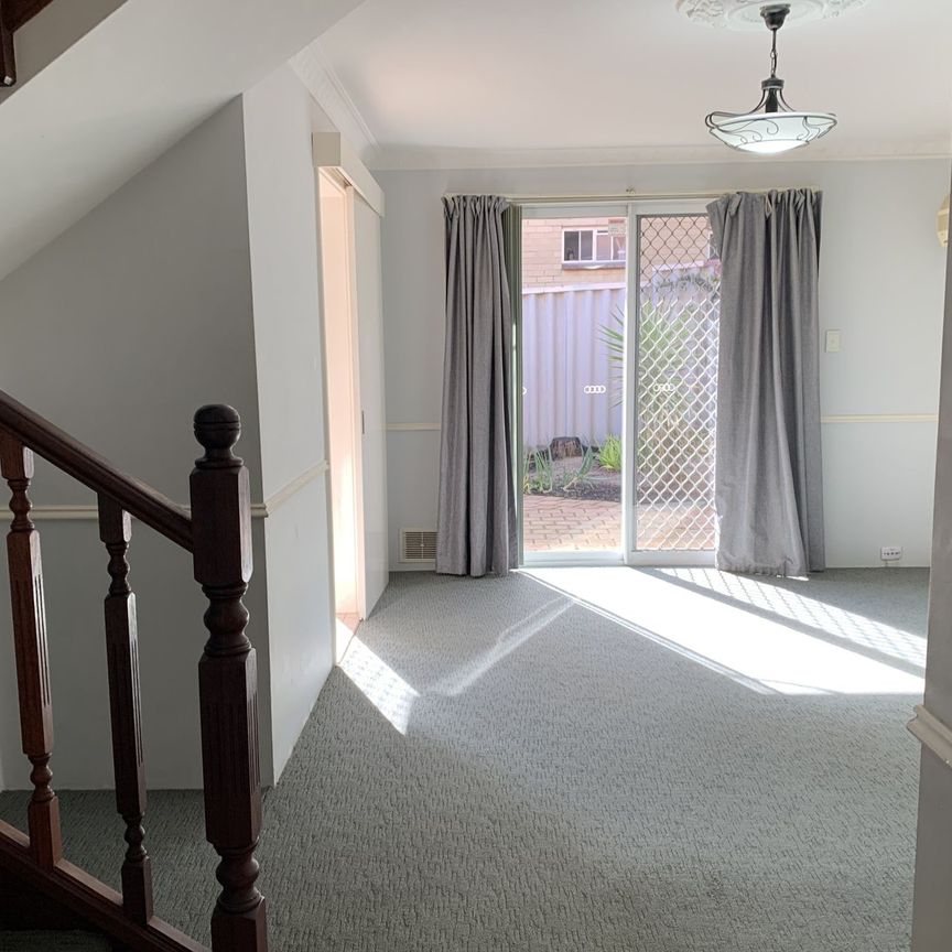 Townhouse Living in a Secure Complex - Photo 1