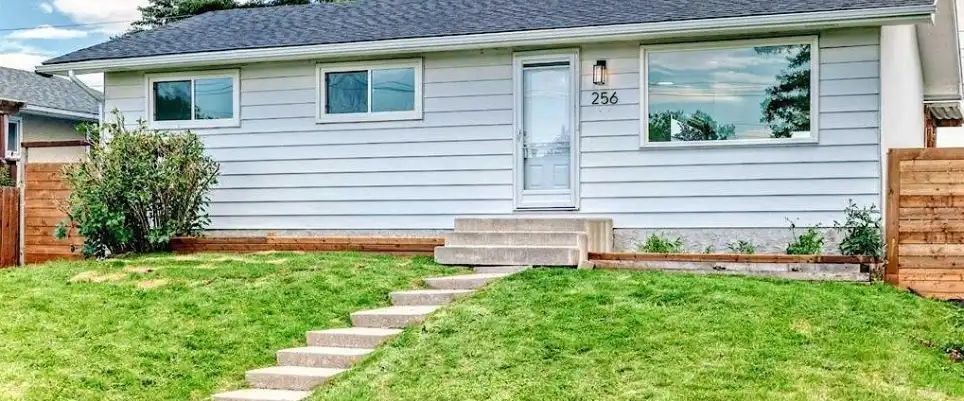 Newly renovated with bright open layout, modern finishes and close to amenities | 256 Penbrooke Close Southeast, Calgary - Photo 1