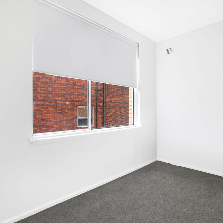 SUNNY TWO BEDROOM APARTMENT WITH SECURE PARKING - Photo 1