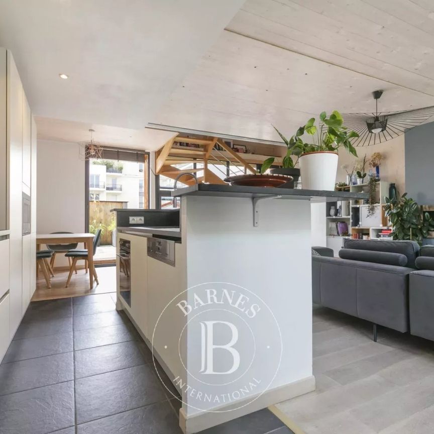 Tout savoir sur cette maison dans le quartier Carnot Gambetta, à Suresnes - Photo 1