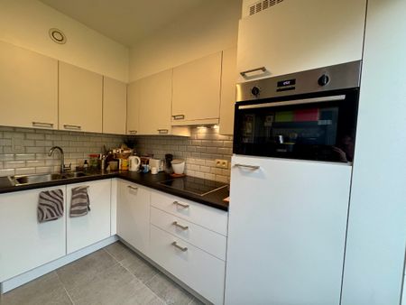 Lichtrijk appartement met garage en tuin in Hoeilaart - Photo 5