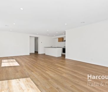 Modern 4-Bedroom Home in the Heart of Beveridge - Photo 1