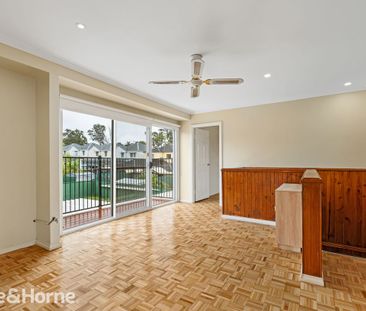 Spacious Family Home in Prime Macquarie Fields Location - Photo 1