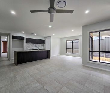 Spacious Family Living with Multiple Living Zones & Alfresco Entert... - Photo 4