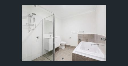 LIGHT-FILLED WITH MULTIPLE LIVING AREAS - Photo 5