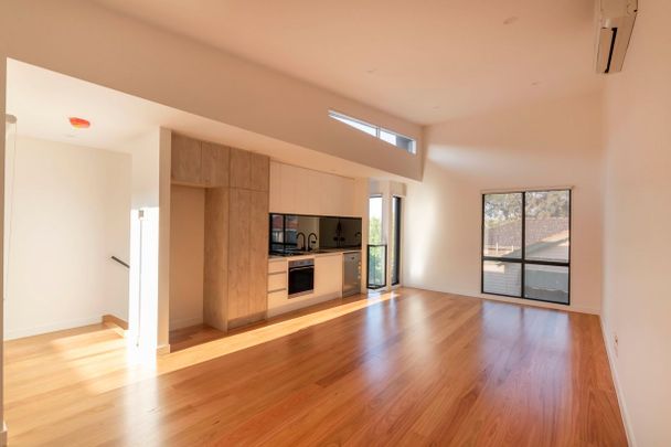 Architectural Townhouse In Brunswick Awaits - Photo 1