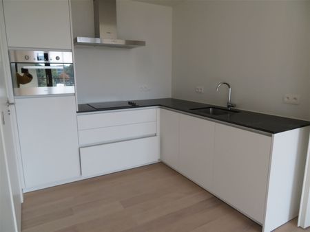 Prachtig nieuwbouwappartement met één slaapkamer, terras en parking! - Photo 4