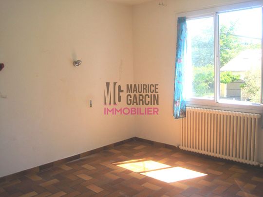 Villa mitoyenne 2 chambres, garage et jardin - Photo 1