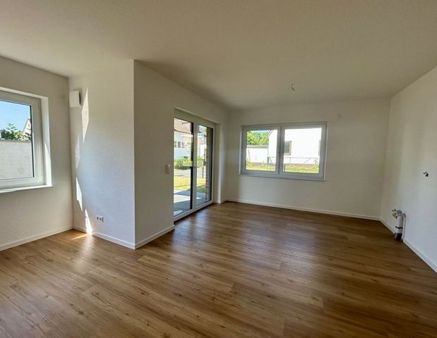 Erstbezug, inkl. EBK im modernen und ebenerdigen Neubau - Foto 1