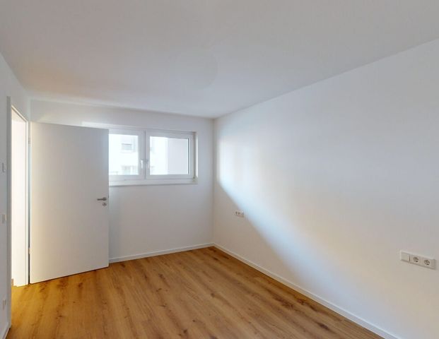Helle 2-Zimmer Erdgeschosswohnung mit EBK und Südterrasse - Foto 1