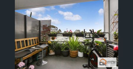 Experience Luxury Living at 'Focus on Mason' - Photo 2