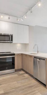 1 Bed + 1 Bath + Den @ River District! *1-year free parking!* - Photo 1