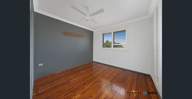 Beachside Townhouse with Private Yard – 100m to East Corrimal Beach - Photo 1