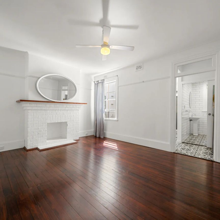 Charming Art-Deco opportunity featuring a tasteful renovation - Photo 1