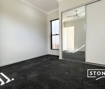 Modern 4-Bedroom Home with Media Room – Perfect for Family Living! - Photo 4