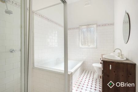 “4-Bedroom Home with Vintage Charm” - Photo 4