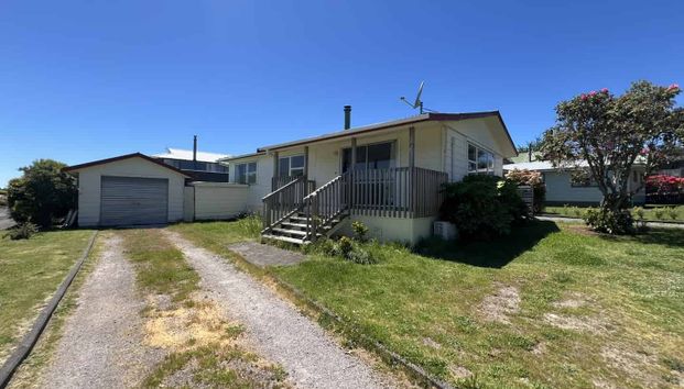 Spacious 3-Bedroom Home in a Prime Location - Photo 1