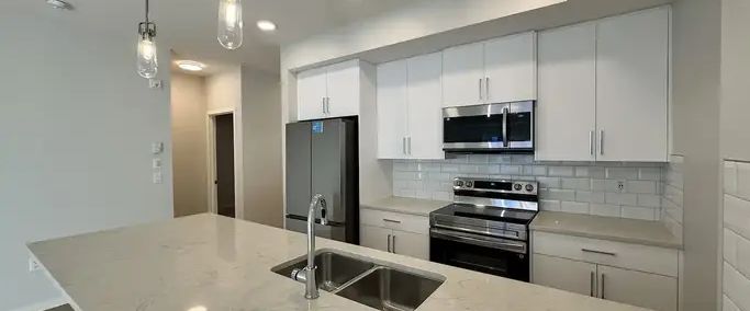 50% DAMAGE DEPOSIT INCENTIVE - BEAUTIFUL BRAND NEW UNIT - 3RD FLOOR | 20295 Seton Way Southeast, Calgary - Photo 1