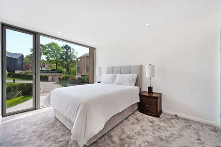 A landmark five-bedroom, five-bathroom residence set within generous south-facing gardens, located in one of the North West's most prestigious village settings. - Photo 2
