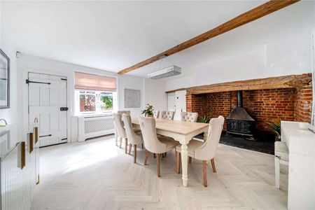 A stylish family home blending timeless character and modern living. - Photo 3