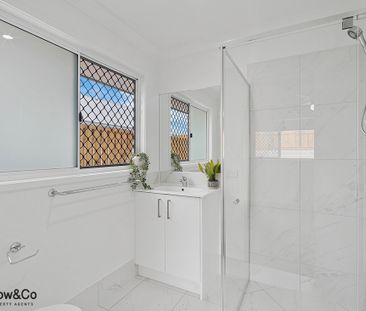 Your beautiful 4-bedroom home awaits! - Photo 1
