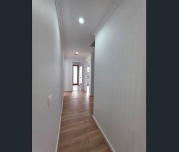 Corner-Block Comfort with Serene Creek Views - Photo 1