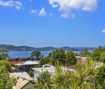 Conveniently Located Cottage with Captivating Water Views - Photo 1