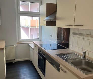 Schöne 3-Zimmerwohnung mit Laminat, EBK und Bad mit Wanne - Photo 5