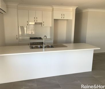 NEAR NEW 4 BEDROOM HOME - Photo 2