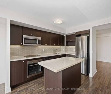 Station Condos! Sparkling clean 1 Bed + Den. European Style Kitchen - Photo 3