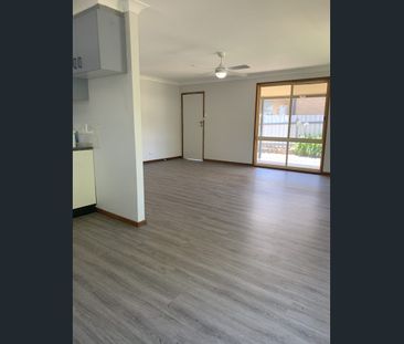 NEAT AND TIDY THREE BEDROOM HOME - Photo 4