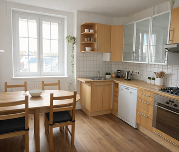 Wunderschöne Dachgeschosswohnung im Zentrum - Foto 3