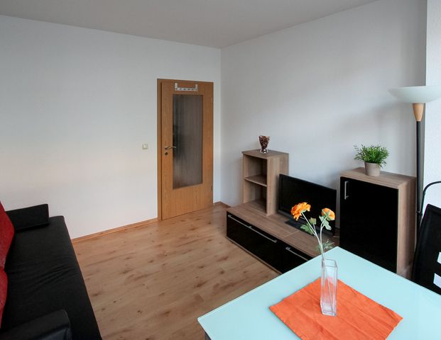 Ihre flexible und möblierte Wohnlösung mit Balkon in perfekter Lage! - Foto 1