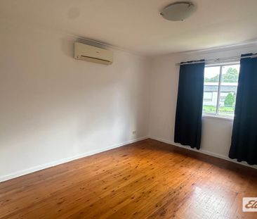 Spacious Family Home with Large Backyard - Photo 2