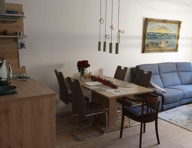 Moderne 3-Zimmer-Wohnung mit Garten und Tiefgarage - Foto 1