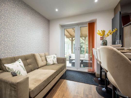 OX Living is proud to present this high-quality 9-bedroom co-living property, perfect for working professionals looking for stylish, stress-free living. Room 1 - Photo 1