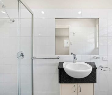Stylish Two-Level Townhome in the Heart of Wilston Village - Photo 6