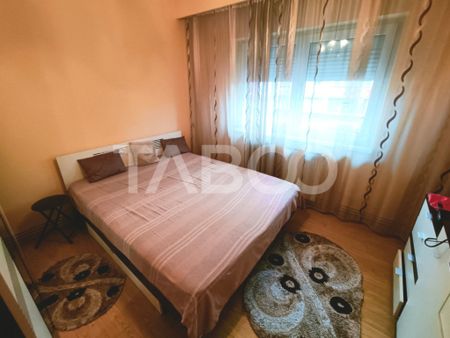 Apartament cu 3 camere 2 bai 63 mp utili etaj 1 in Sibiu zon - Fotografie 5