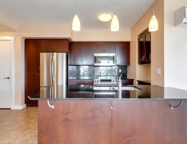 Corner 2 bedroom 2 bathroom condo at London Heritage | 810 - 8880 Horton Road Southwest, Calgary - Photo 1