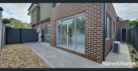 Modern Living in a Thriving Location! - Photo 2