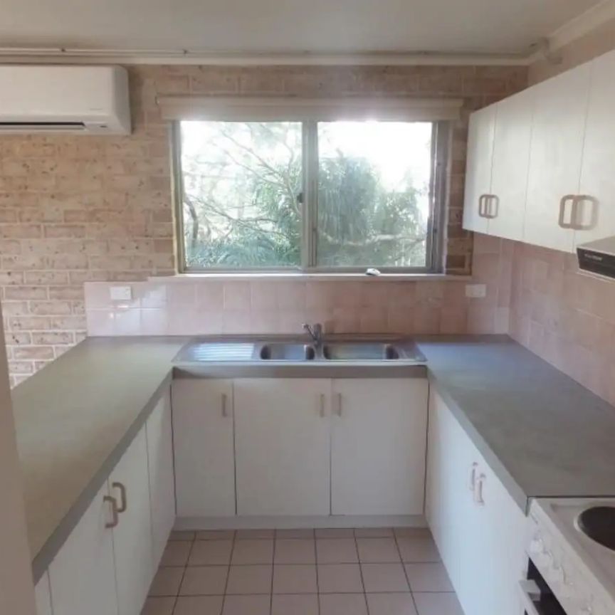 “SPACIOUS TWO BED UNIT IN QUIET BLOCK AND CONVENIENT LOCATION” - Photo 1